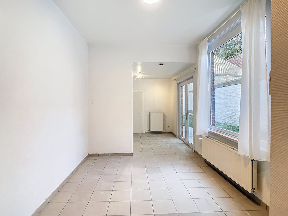 Duplex-appartement met 1 kamer en stadstuin in centrum Ieper - foto 5