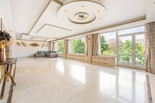 This exclusive apartment offers an outstanding level of space and comfort, featuring 4 full-sized bedrooms and 3 bathrooms, ideal for large families or those seeking generous living areas. The bathrooms are designed for maximum comfort and include 3 walk-in showers and 2 double sinks. The bright and spacious living room, with large floor-to-ceiling windows, enjoys beautiful views over the city park.<br /><br />The property is finished with high-end custom carpentry and premium materials, including marble. A spacious terrace is located adjacent to the kitchen, while the bedrooms at the rear also benefit from access to a second terrace.<br /><br />Located at Van Eycklei 45 in 2018 Antwerp, this prime location offers walking distance access to the city park, shops, public transport, and main access roads—combining greenery with vibrant city living.<br /><br />The building is equipped with an elevator that provides access all the way to the basement storage and underground parking garage. Two underground parking spaces are available with the apartment at €40,000 per space.