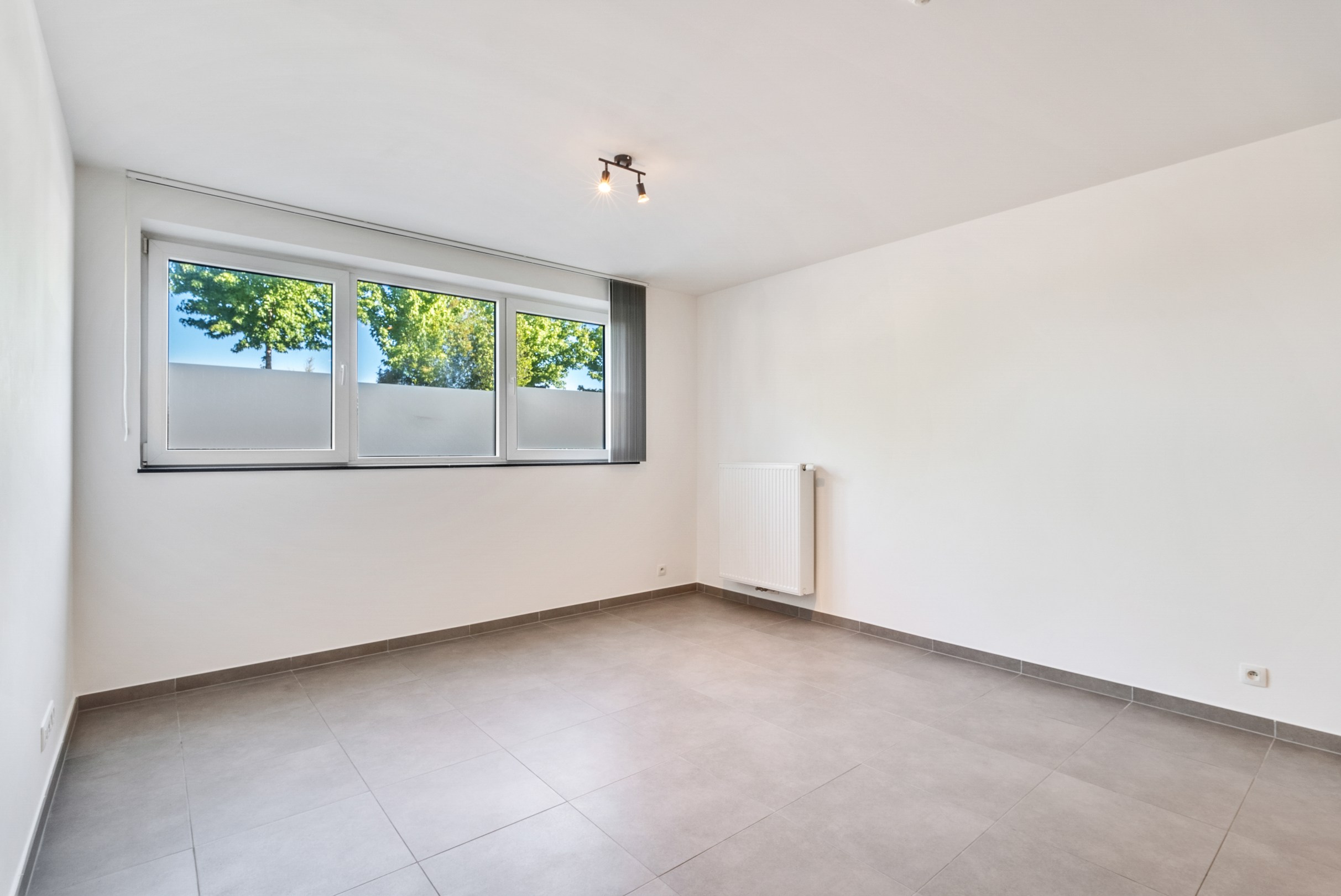 Gelijkvloers appartement met private tuin - foto 4
