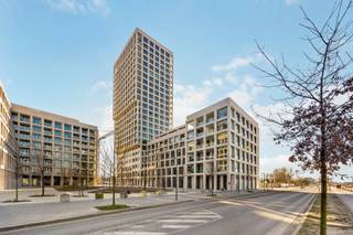 Nieuwbouwappartement met frontaal Scheldezicht in een standingvol gebouw dat werd ontworpen door architect Max Dudler, gelegen op Nieuw Zuid;...