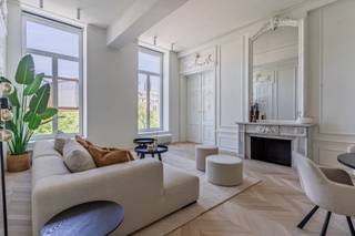 LIGGINGDit exclusieve appartement is gelegen in Residentie B’eau Kouter, een prestigieus vernieuwbouw project op de Kouter midden in het centrum van...