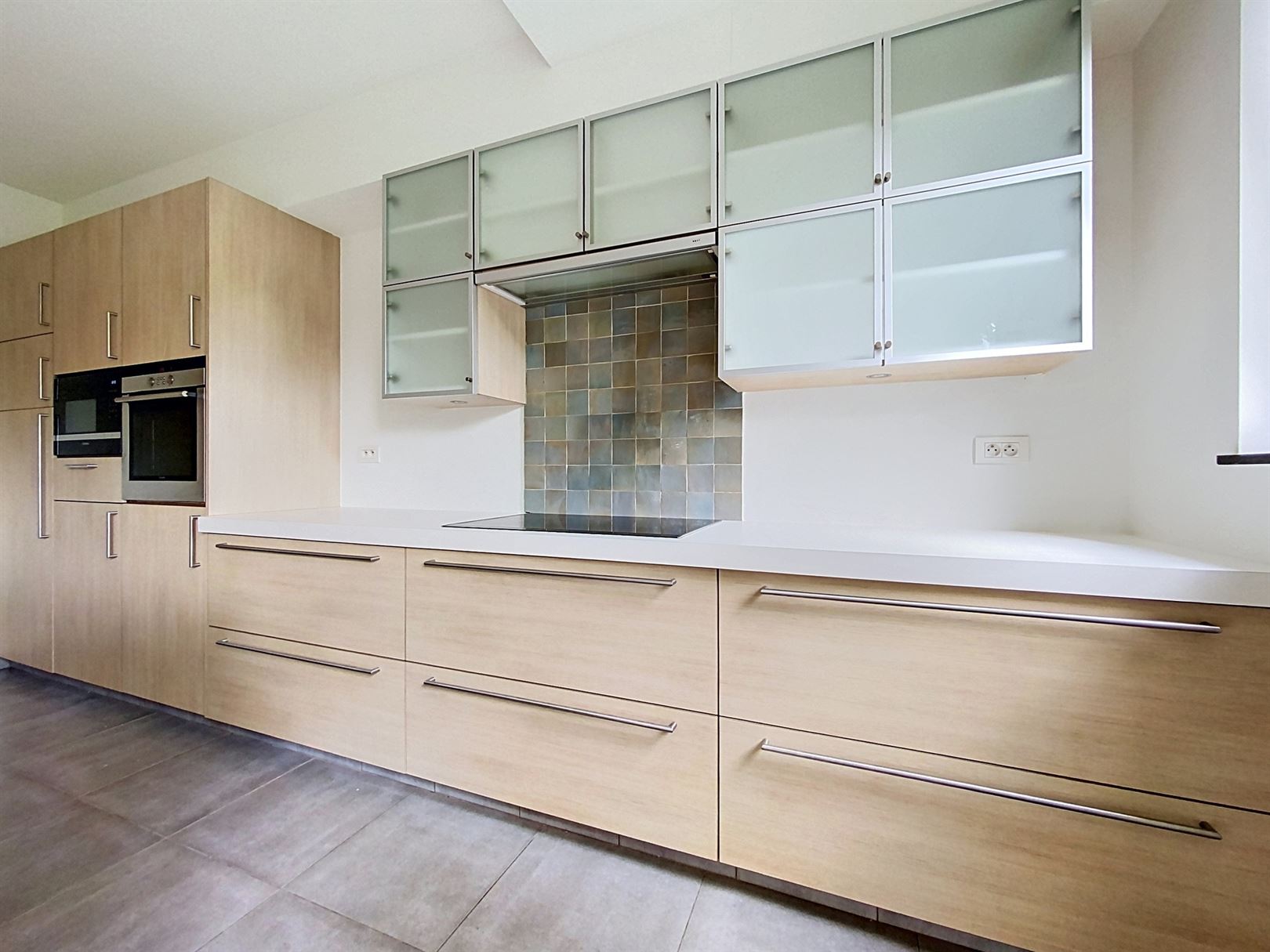 Gelijkvloersappartement met gezellige tuin en P - foto 4