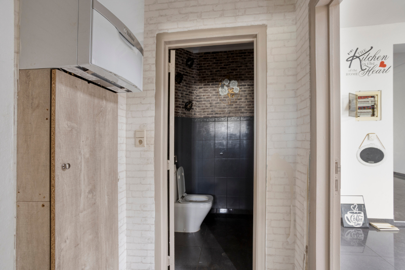 Op te knappen woning met veel potentieel in rustige woonomgeving - foto 4