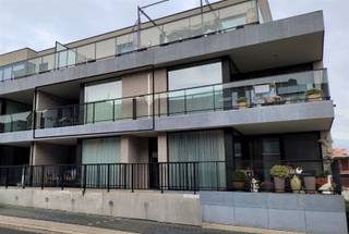 Modern en instapklaar appartement met 2 slaapkamers en zuidgericht terras In residentie Apollo, Hof ter Weyer 3 in Hoeselt, op een steenworp van het...