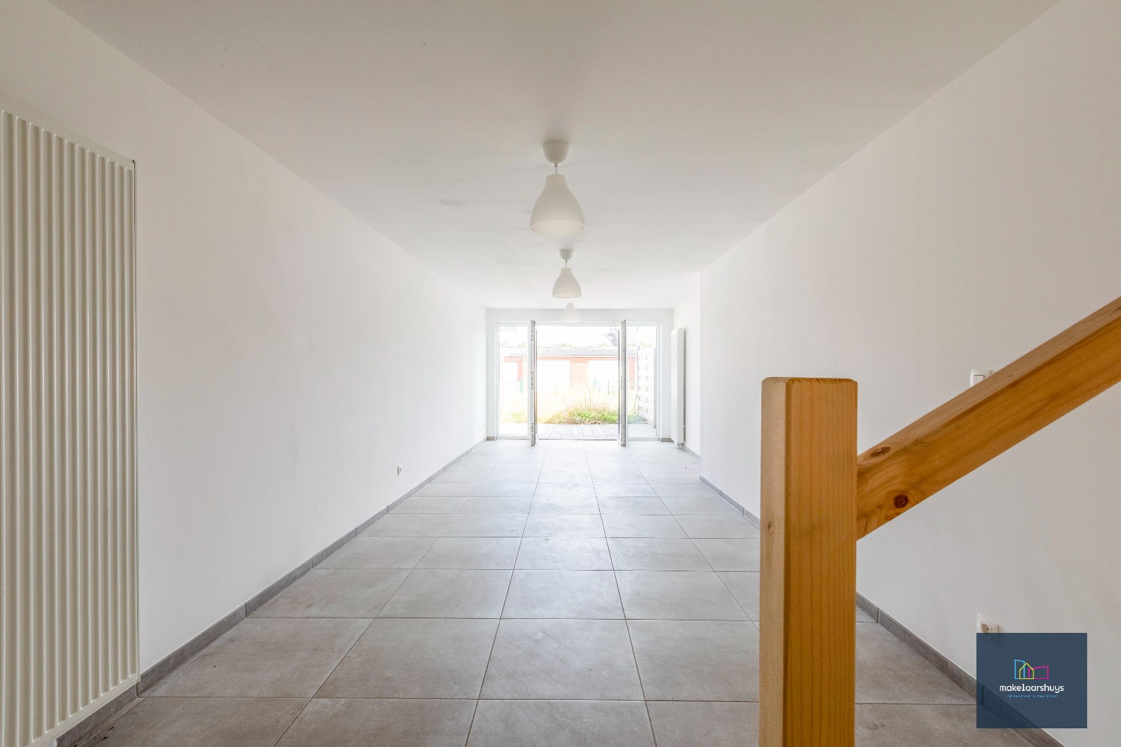 Instapklare gerenoveerde woning in rij met terras, tuin en garagebox - foto 4