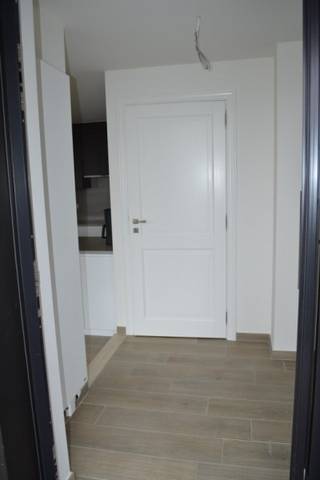 Dit appartement met een oppervlakte van +/- 130m² is gelegen in het centrum van Nijlen en omvat: inkomhal met gastentoilet, grote leefruimte met...