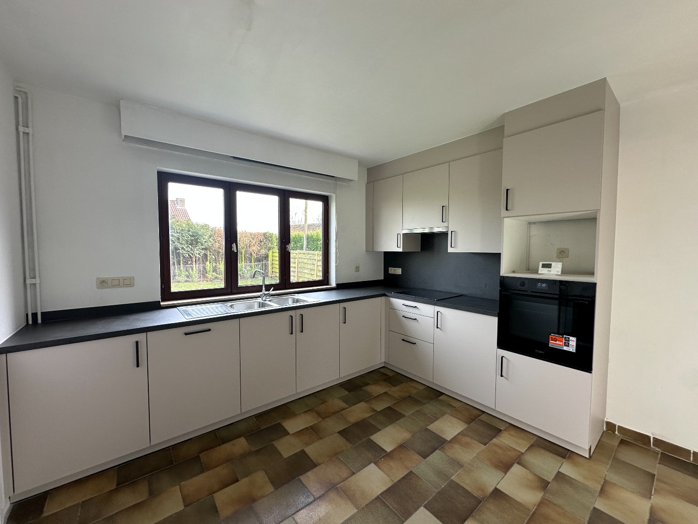 Ruime woning met 3 + 1 slaapkamers en rustige achtertuin in Sleidinge - foto 4