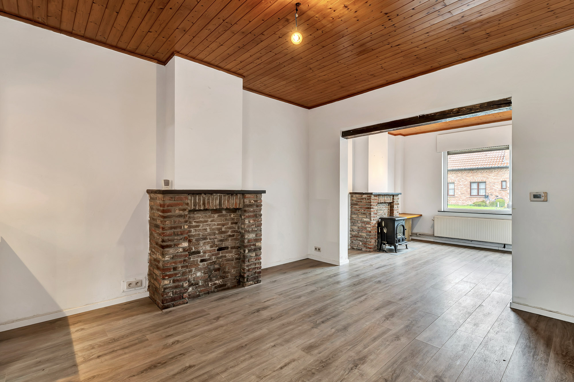 Gezellige rijwoning met tuin en achteruitweg - foto 3