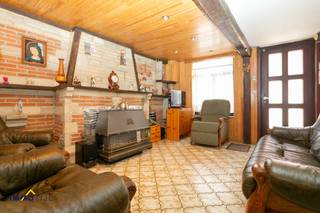 Deze eengezinswoning met een bewoonbare oppervlakte van 95m² bevindt zich op een perceel van 1are61ca en is gelegen aan de legendarische Muur...