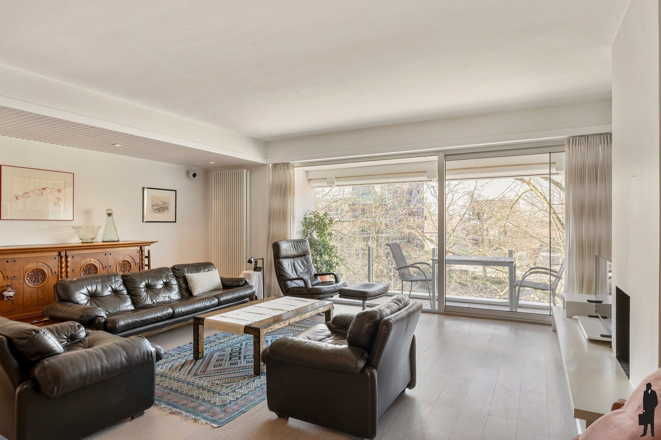 Dit lichtrijke en instapklare appartement combineert comfort, ruimte en een warme uitstraling op een uitstekende ligging. - foto 4