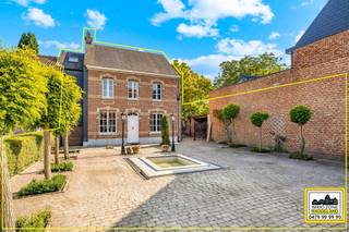 <p>"ABSOLUTE TOPPER – Afspraak ENIGE BEZOEKDAG ENKEL telefonisch via Elias Le Juste op 0487/ 33. 10. 10., meer info via Facebook "Remue Randy" – LIKE de pagina en blijf op de hoogte van alle nieuwe woningen. De stukken van de woning zijn te consulteren op www.immo-zone.be." In BREENDONK ontdekken we deze statige burgerwoning, die niet alleen uitblinkt als karaktervolle gezinswoning, maar tevens tal van mogelijkheden biedt voor commercieel gebruik. De woning is gelegen op een uitzonderlijk perceel van 2108 m² en wordt omringd door een grote tuin met vijver. De brede oprit en handige carport bieden comfortabele parkeergelegenheid. Indeling: Bij het binnenkomen worden we verwelkomd in een royale inkomhal met aansluitend een stijlvolle bureauruimte. De ruime leefruimte is afgewerkt met natuursteen en geniet van veel lichtinval dankzij de grote raampartijen, met toegang tot de zuidgerichte tuin. De keuken is volledig uitgevoerd in graniet, met aansluitend een opbergruimte. Verder vinden we een aparte wasplaats, een luxueuze badkamer en een afzonderlijk toilet. Op de eerste verdieping bevinden zich vier volwaardige slaapkamers en een tweede badkamer. De ruime zolderverdieping biedt talloze mogelijkheden. De prachtig aangelegde tuin met vijver en sfeervol bijgebouw maakt het geheel compleet.Deze woning is een ABSOLUTE TOPPER voor gezinnen en investeerders. <br />P-score: A / G-score: A.<br />VOOR ZEER SNELLE BESLISSERS!<br />IMMO ZONE RHODELAND – ELIAS LE JUSTE – 0487/ 33. 10. 10.<br /> </p>