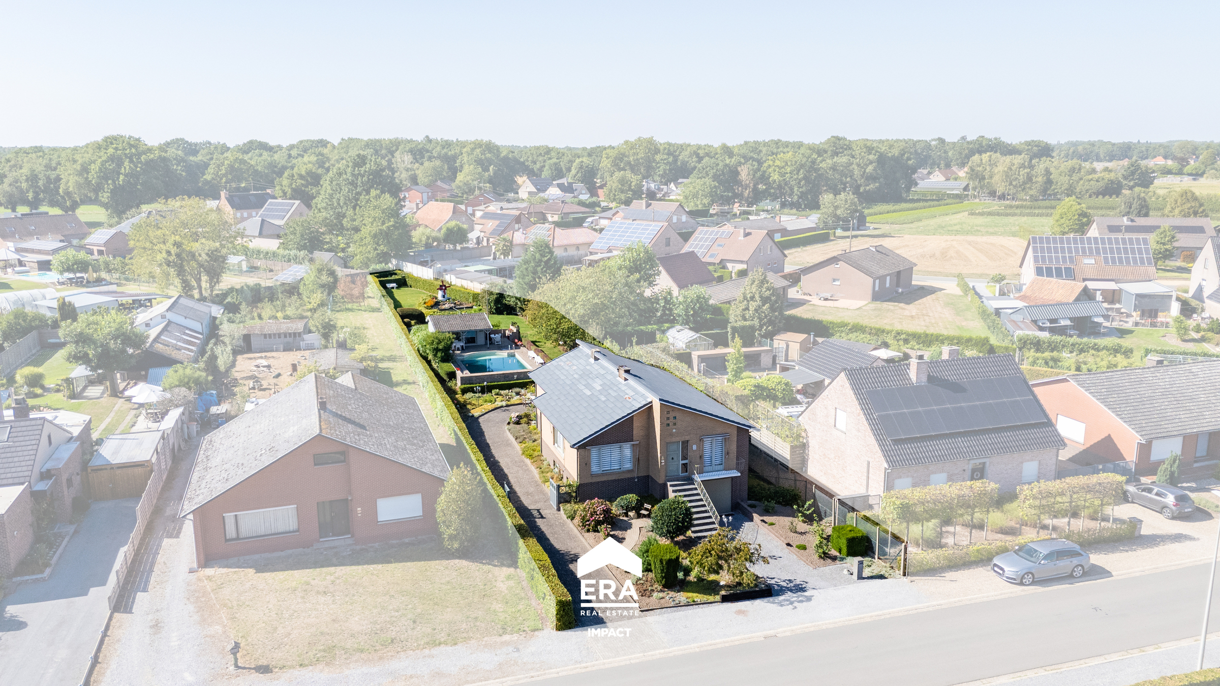 Split level woning met zwembad op 20a in rustige buurt - foto 2