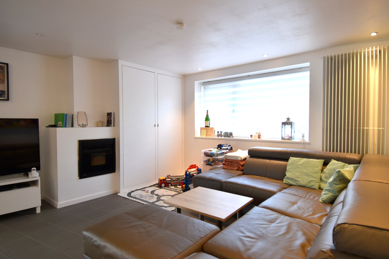 Halfopen bebouwing met 2 slaapkamers, garage en gezellig zonneterras te koop in Bellegem - foto 2