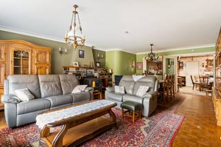 Ruime woning met potentieel in de dorpskernIn het hart van de dorpskern bevindt zich deze ruime woning met inpandige garage. De woning werd steeds...