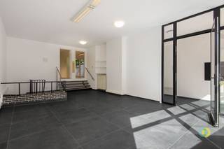 <p><span>This ground floor commercial space features a functional and versatile layout, ideal for a variety of professional activities. The commercial space on the ground floor has an area of 34.5 m² and can perfectly serve as a retail space, reception or client reception area. In addition, there are two separate rooms of approximately 13.5 m² each, which can be used flexibly as office space, practice space, consultation room, treatment room or meeting room. On the -1 level there is a stock room with an adjoining checkroom, providing additional practical storage and comfort options. This combination of commercial space, office/practice spaces and storage makes the property ideally suited for a liberal profession, service activity or commercial business. </span></p>