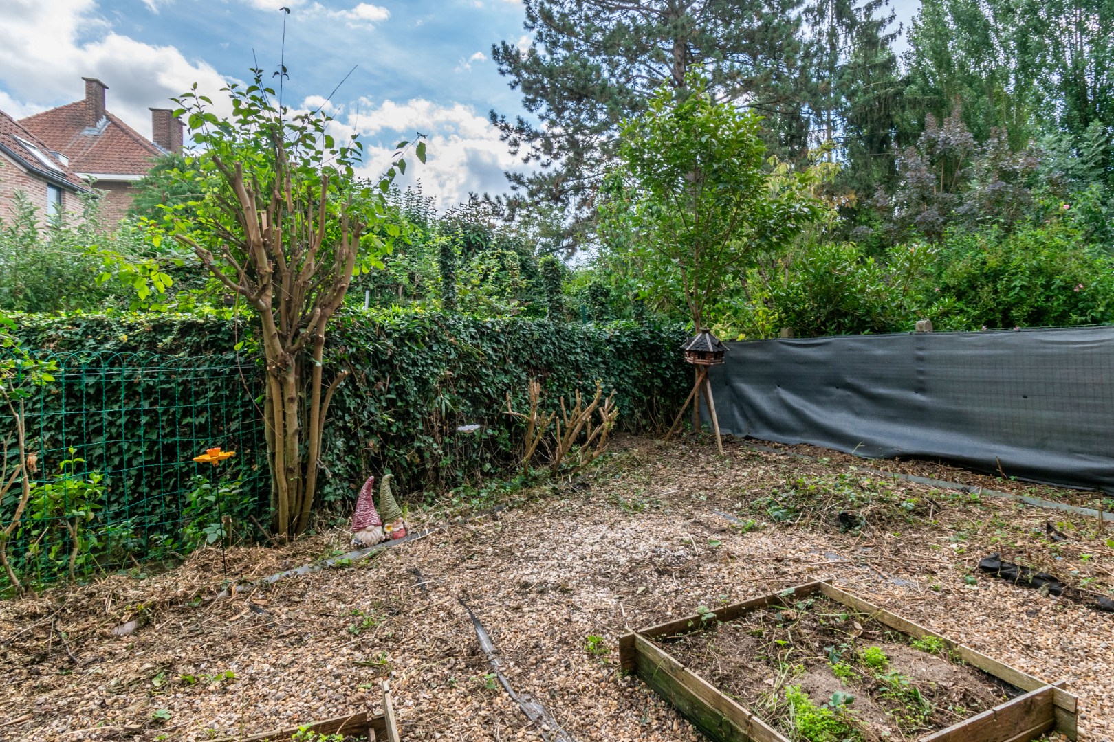 OPBRENGSTGEBOUW MET 2 APPARTEMENTEN, GARAGE & TUIN ! - foto 5