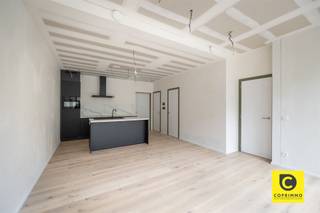 <p><span>Exclusive living at 'The Vault': Modern 1-bedroom apartment in the heart of Antwerp</span></p><p><span>Do you dream of a luxurious home in Antwerp’s vibrant Theaterbuurt neighborhood? Welcome to 'The Vault', an architectural masterpiece designed by Luc Binst. This exclusive new-construction project combines the energy of the city center with the serene tranquility of a quiet side street. Here, you’ll live in a top-tier BEN (Nearly Energy-Neutral) home, where style and sustainability go hand in hand. Everything Antwerp has to offer is right at your doorstep: from the luxurious boutiques on Schuttershofstraat and the Meir to world-class cuisine at the nearby Botanic Sanctuary. Culture lovers will be in their element with the Bourla Theater and the City Park within walking distance.</span></p><p><span> </span></p><p><span>Bright living space &, open kitchen</span></p><p><span>As soon as you walk in, you’ll immediately sense the high-quality character of this approximately 57 m² apartment. Thanks to the floor-to-ceiling windows, the living space is bathed in natural light, creating a wonderfully open and airy feel. The open kitchen is seamlessly integrated into the space and finished with high-quality materials. Whether you’re starting your day with breakfast or hosting friends for dinner, the space exudes class and comfort.</span></p><p><span> </span></p><p><span>Terrace</span></p><p><span>A major highlight is the covered terrace of approximately 5 m², the perfect spot to enjoy a cup of coffee or a good book in complete privacy.</span></p><p><span> </span></p><p><span> & -Style Bedroom</span></p><p><span>The bedroom is an oasis of tranquility, finished with an eye for detail. The bathroom features modern fixtures, including a walk-in shower and a stylish vanity unit. Additionally, the apartment includes a practical storage closet, ensuring a tidy interior. Thanks to Type D ventilation, you’ll always enjoy a healthy indoor climate.</span></p><p><span> </span></p><p><span>Top-Level Sustainability</span></p><p><span>This apartment was built with the future in mind. With an energy rating of 20 or lower, the home is officially BEN (Nearly Energy Neutral). The integration of solar panels not only supports a sustainable lifestyle but also results in significantly lower energy bills.</span></p><p><span> </span></p><p><span>Rent, fees & availability</span></p><p><span>Rent: €975/month </span></p><p><span>Common area fees: €75/month (maintenance of common areas)</span></p><p><span>Security deposit: one-time payment of €250</span></p><p><span>Available: Immediately</span></p><p><span> </span></p><p><span>Key features at a glance:</span></p><p><span>- Architectural class: Designed by the renowned Luc Binst.</span></p><p><span>- Extremely energy-efficient: BEN-certified home (E20 or lower) including solar panels.</span></p><p><span>- Prime location: Situated in the heart of the Theaterbuurt neighborhood, near the Botanic Sanctuary and the Meir.</span></p><p><span>- Move-in ready: High-quality finishes with plenty of natural light thanks to generous windows.</span></p><p><span>- Outdoor living: Covered terrace of approx. 5 m²</span></p>