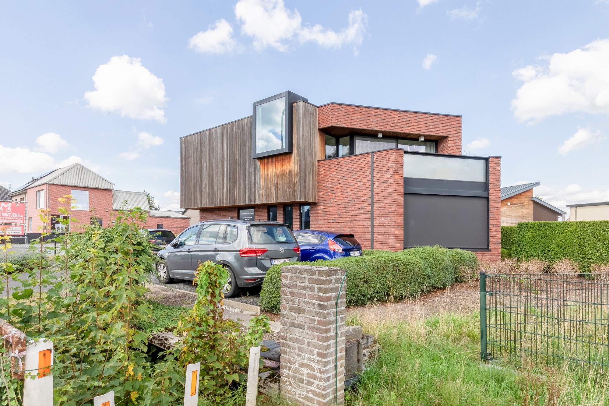 Modern kantoorgebouw met verhuurd appartement op uitstekende zichtlocatie in Belsele - foto 5