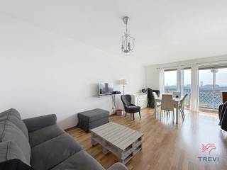 MOLENBEEK-SAINT-JEAN. Bel appartement de +/- 95 m² situé au 5ème étage, 2 chambresAu 5ième étage : * Hall d'entrée * Living de ± 26m² accès à la...