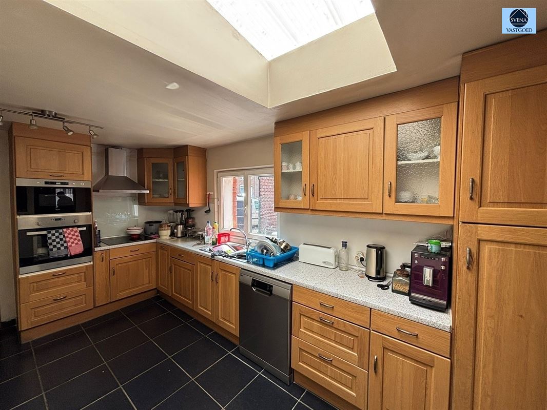 WONING MET 5 SLAAPKAMERS EN STADSTUINTJE. - foto 2