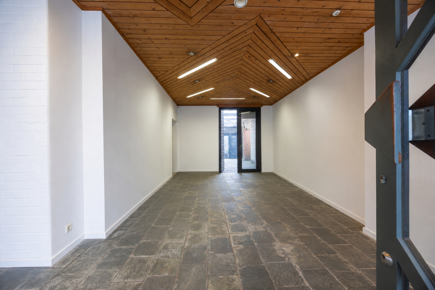Woning met handelsgelijkvloers op commerciële ligging - foto 3