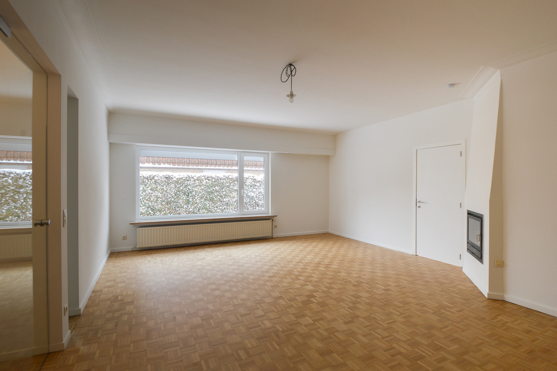 GELIJKVLOERS APPARTEMENT MET GARAGE EN TUIN - foto 4