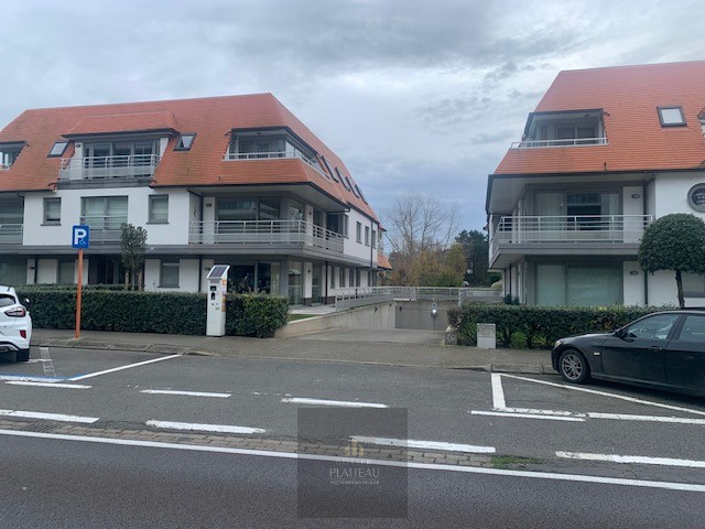 Large garage box with automatic door on level -1 of the Vivaldi residence in Nieuwpoort-Bad. - photo 1