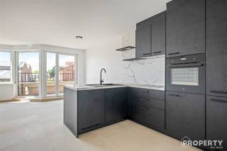 Appartement op de eerste verdieping met terras Ben je op zoek naar een instapklaar, modern en energiezuinig appartement op een centrale ligging? Dan...