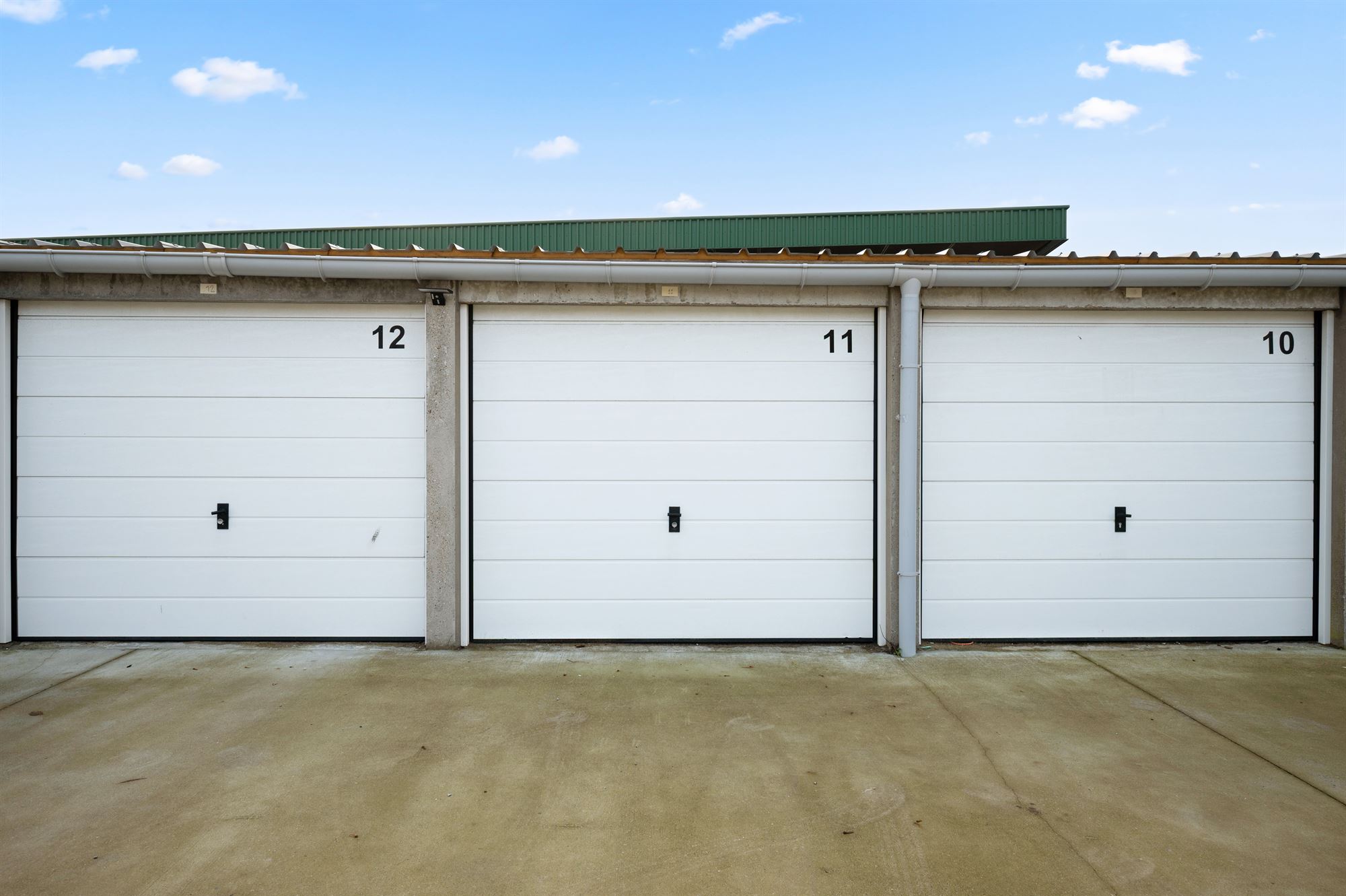 5 vernieuwde en volledig verhuurde garageboxen - foto 5