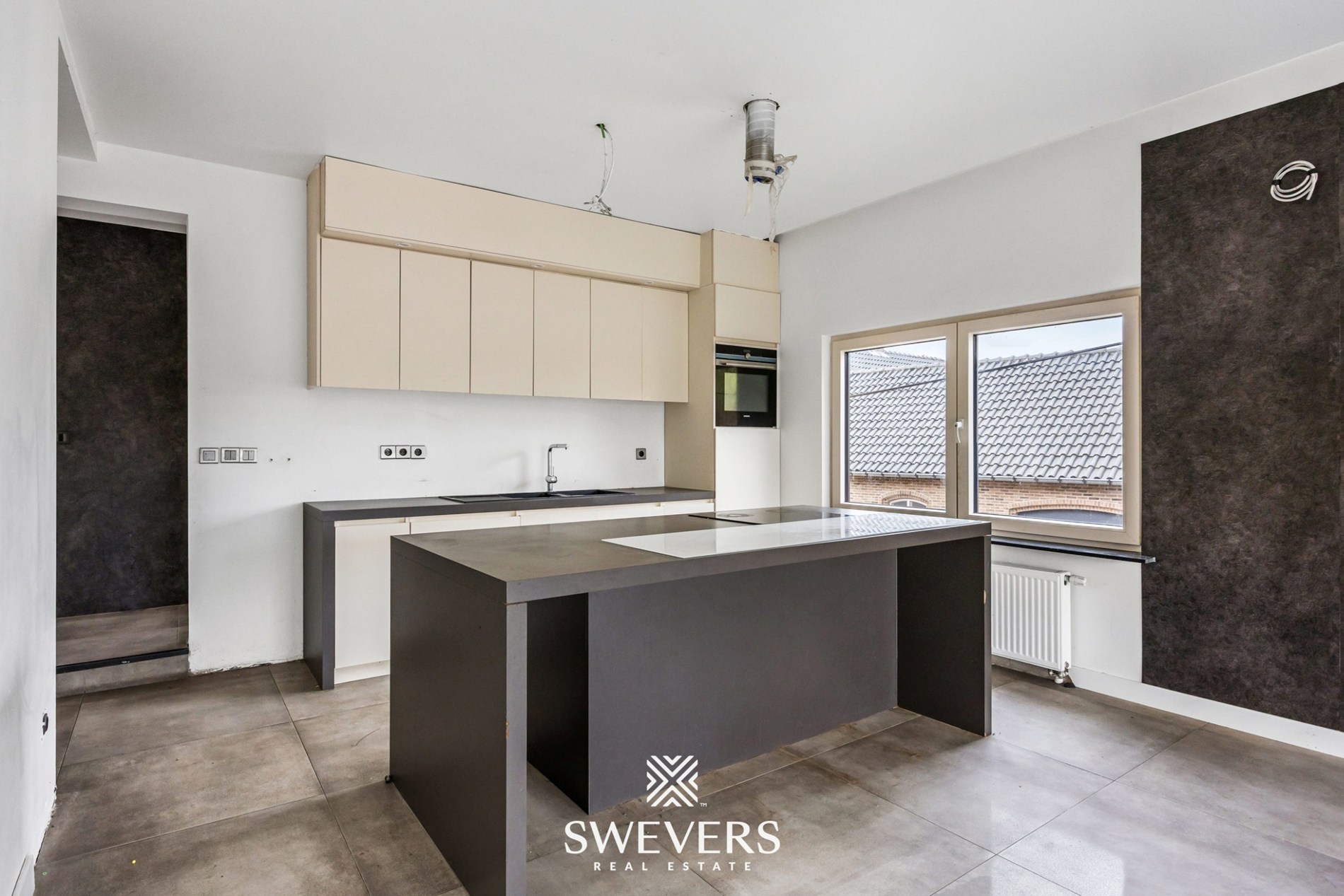 Ruim appartement met gemeenschappelijke tuin te Lummen - foto 4