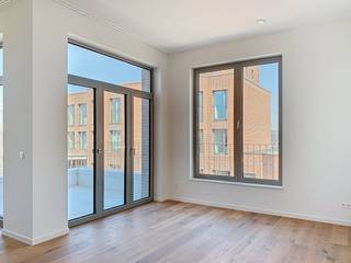 Tour & Taxis - Penthouse 2 slaapkamers met 2 badkamers is gelegen op de 5de verdieping van het Metropolitan gebouw in het nieuwbouwproject Park...