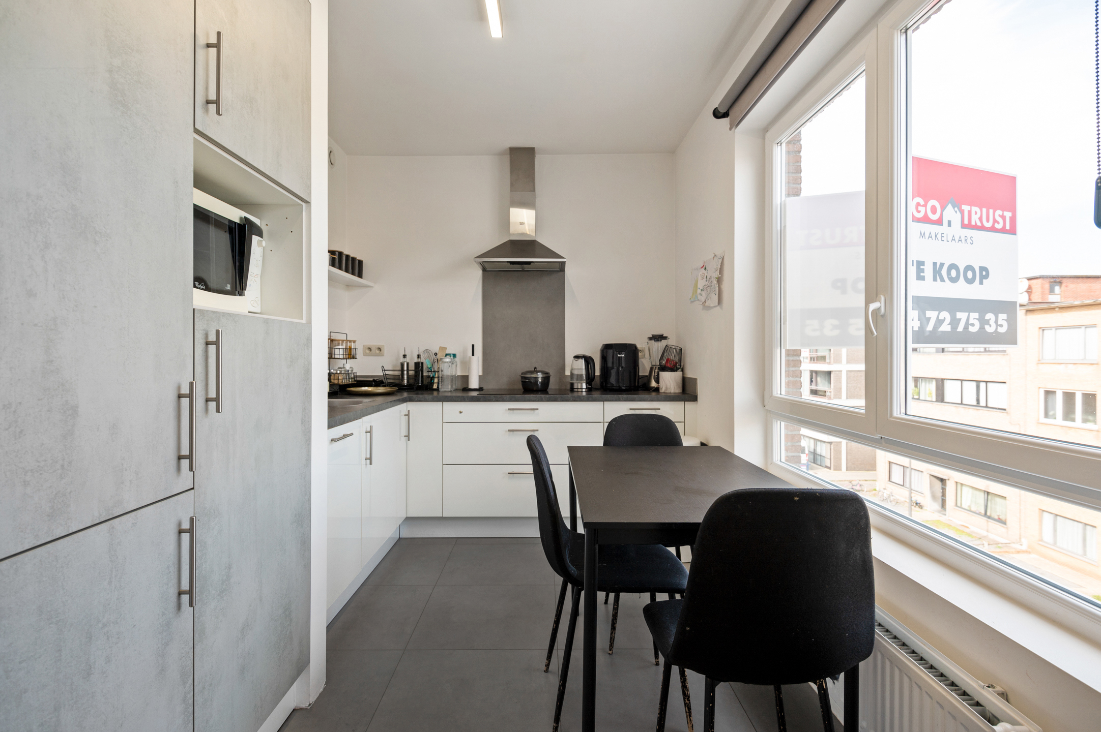 Goed onderhouden dakappartement met 2 slaapkamers en garagebox - foto 4