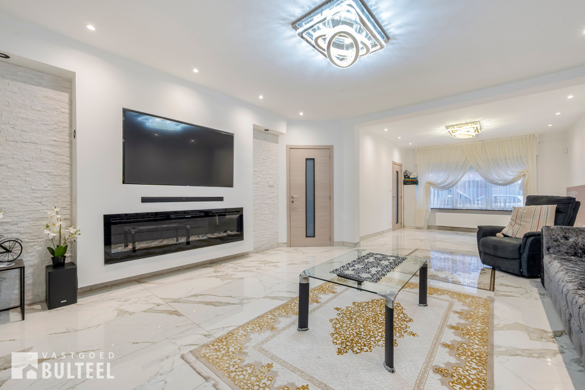 Zeer ruime en instapklare woning met 4 slaapkamers en tuin. - foto 2