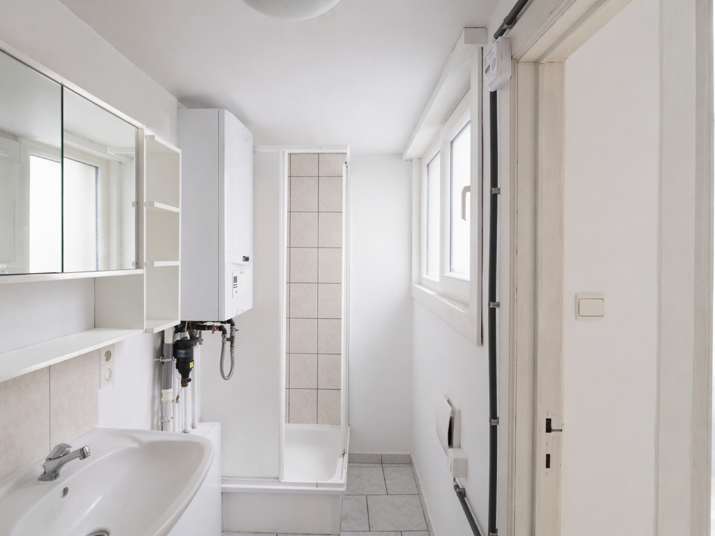 Opbrengsteigendom bestaande uit verschillende studio's en éénslaapkamerappartementen in het centrum van Gent. - foto 5