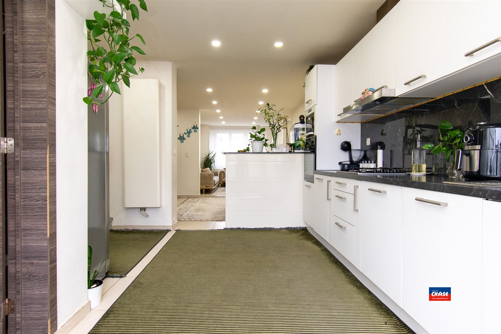 Rijwoning met 2 slpks en tuin  - foto 4