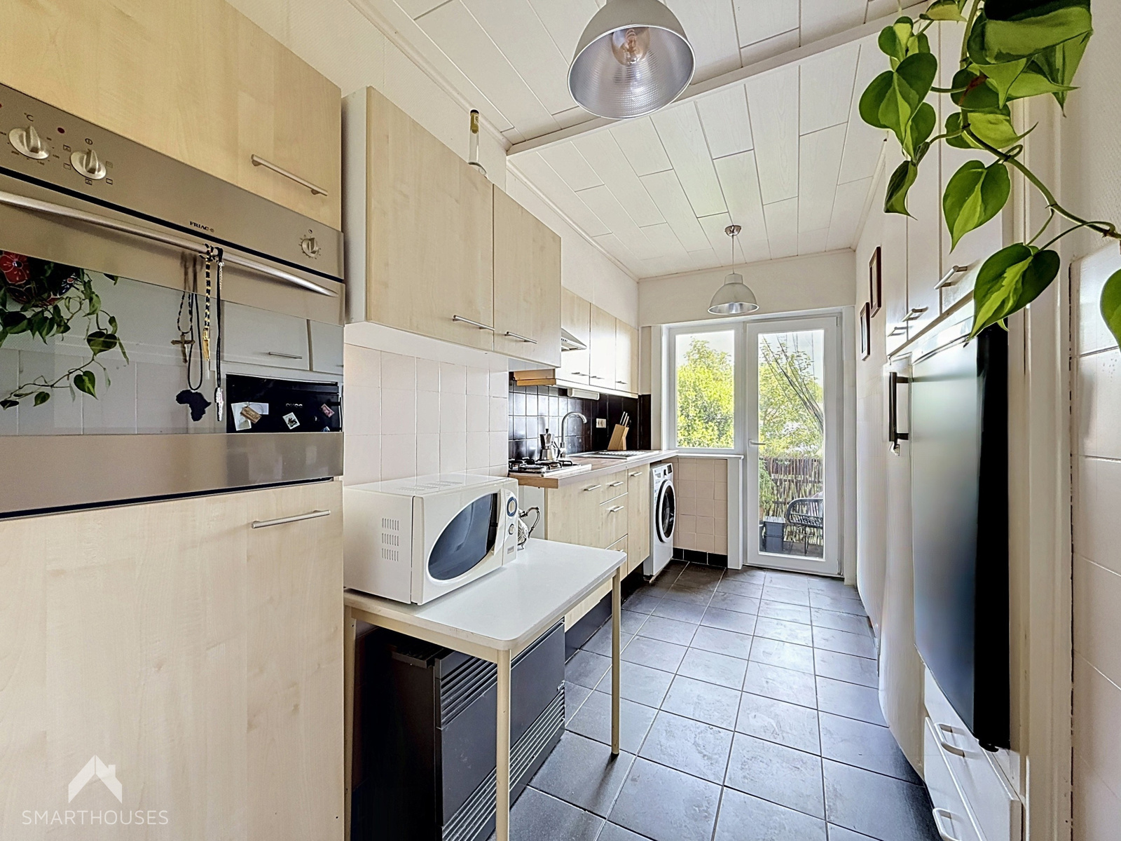 Centraal gelegen 2-slpk appartement, ruime garage en berging - foto 5