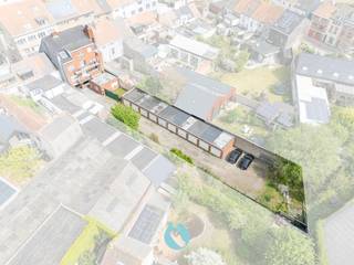 Opbrengsteigendom bestaande uit 4 appartementen, 10 garages en 4 staanplaatsen, gelegen op een strategische locatie langs de Dendermondsesteenweg...