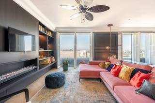 <p>A stylish, move-in-ready flat on the 8th floor in the sought-after Nieuw Zuid neighbourhood. This high-quality flat exudes class and comfort, featuring premium materials and an eye for detail.</p>
<p>The light-filled living area forms the heart of the home and flows seamlessly onto the cosy terraces, where you can enjoy a stunning view in complete tranquillity. The gas fireplace adds a warm and atmospheric touch to the living area.</p>
<p>The apartment features two spacious bedrooms, each offering ample space and natural light, and two modern bathrooms finished with high-quality materials and offering contemporary comfort.</p>
<p>This project was designed by DRDH Architects, with Daniel Rosbottom and David Howarth, who strive for sustainable, context-sensitive architecture that transcends trends and enriches the city. Their vision combines recognisable, robust forms with a strong connection to the surroundings, featuring distinctive...</p>
<p>The architectural approach is clearly evident throughout the development, with the designs forming part of the urban fabric and enhancing its character, as can be seen, for example, in the ZICHT project in Nieuw Zuid.</p>
<p>In short, an exceptional apartment that perfectly combines luxury, space,</p>