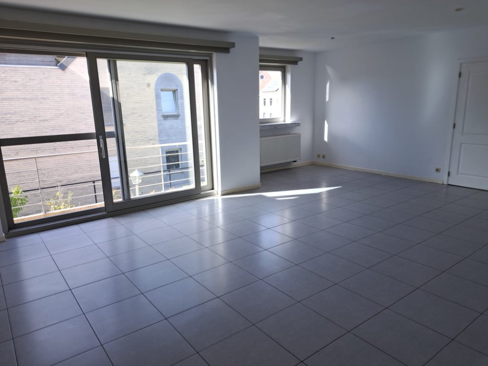Een centraal gelegen appartement op de eerste verdieping met ondergrondse parkeerplaats en lift - foto 5