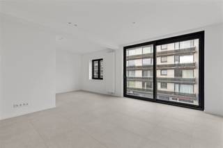 Gerenoveerd appartement op de tweede verdieping met ruim terras Dit energiezuinig appartement is toegankelijk via de trap en is als volgt...