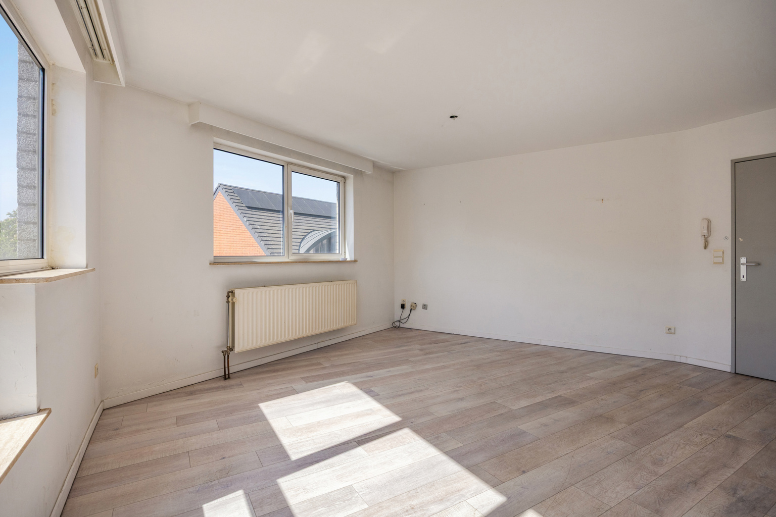 Centraal gelegen appartement met staanplaats - foto 3