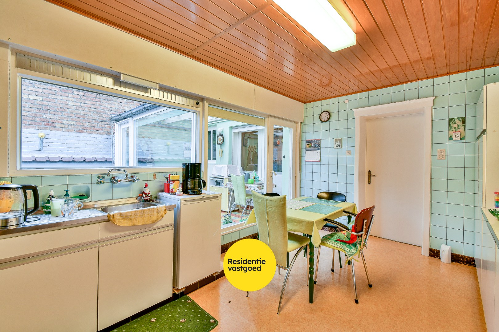 Te renoveren gezinswoning met drie slaapkamers en zongerichte tuin - foto 5