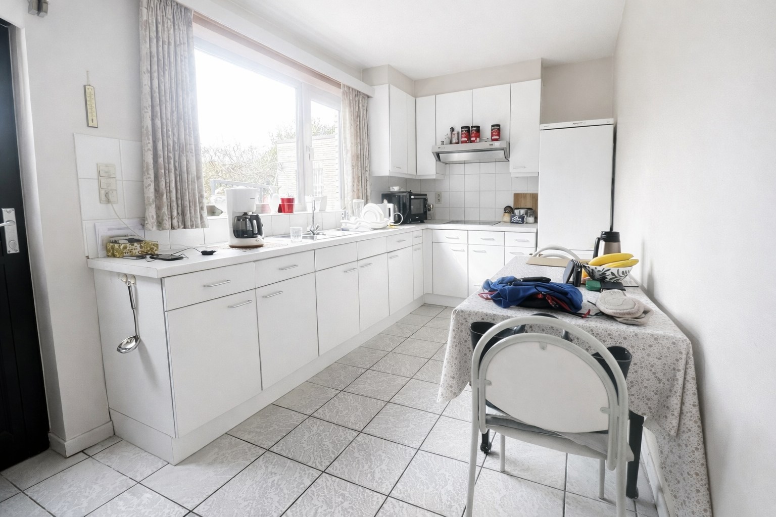 Gelijkvloers appartement met tuin en garagebox - foto 4