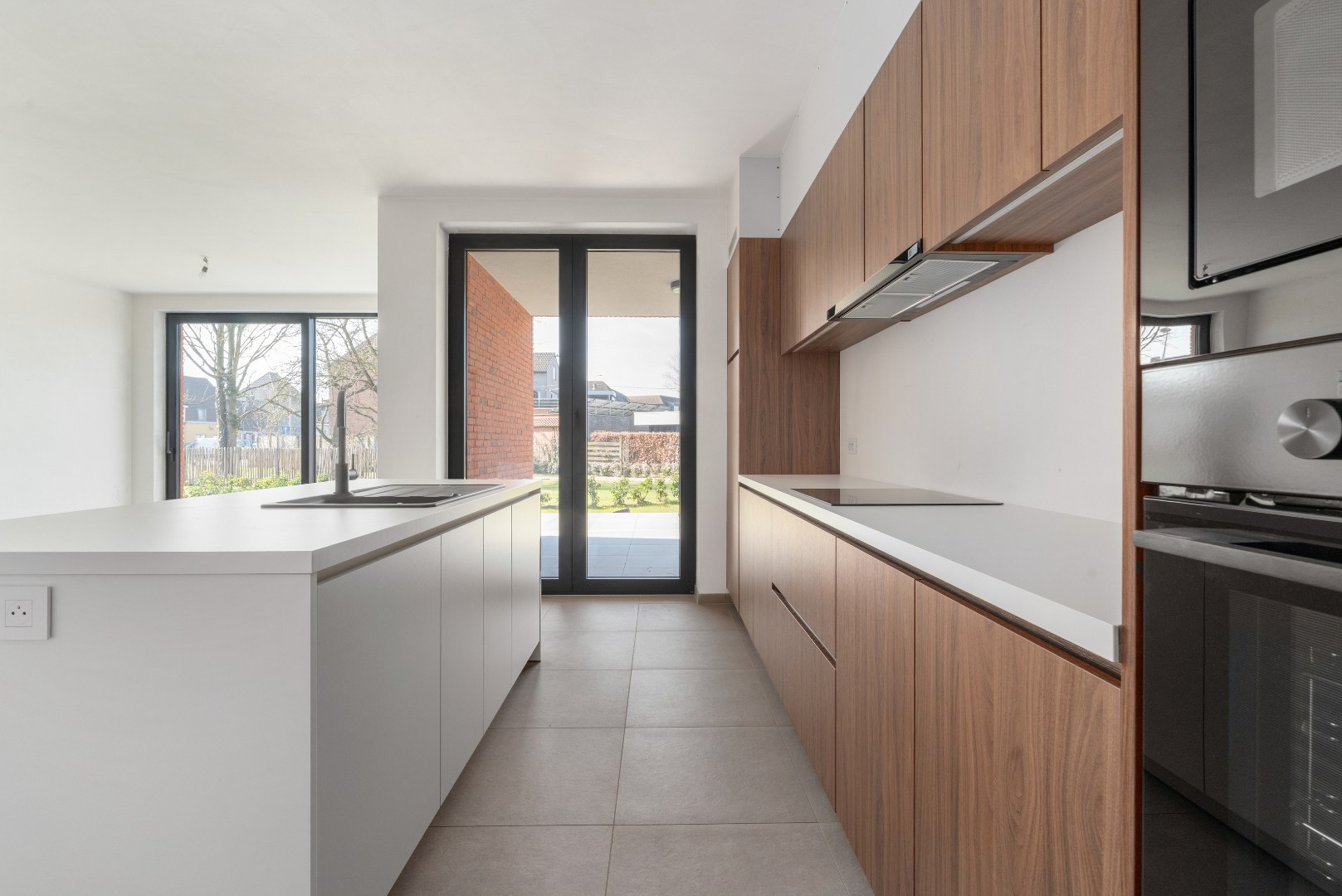 Nieuwbouwappartement met twee slaapkamers, tuin en ondergrondse autostaanplaats te koop in Zulte - foto 4