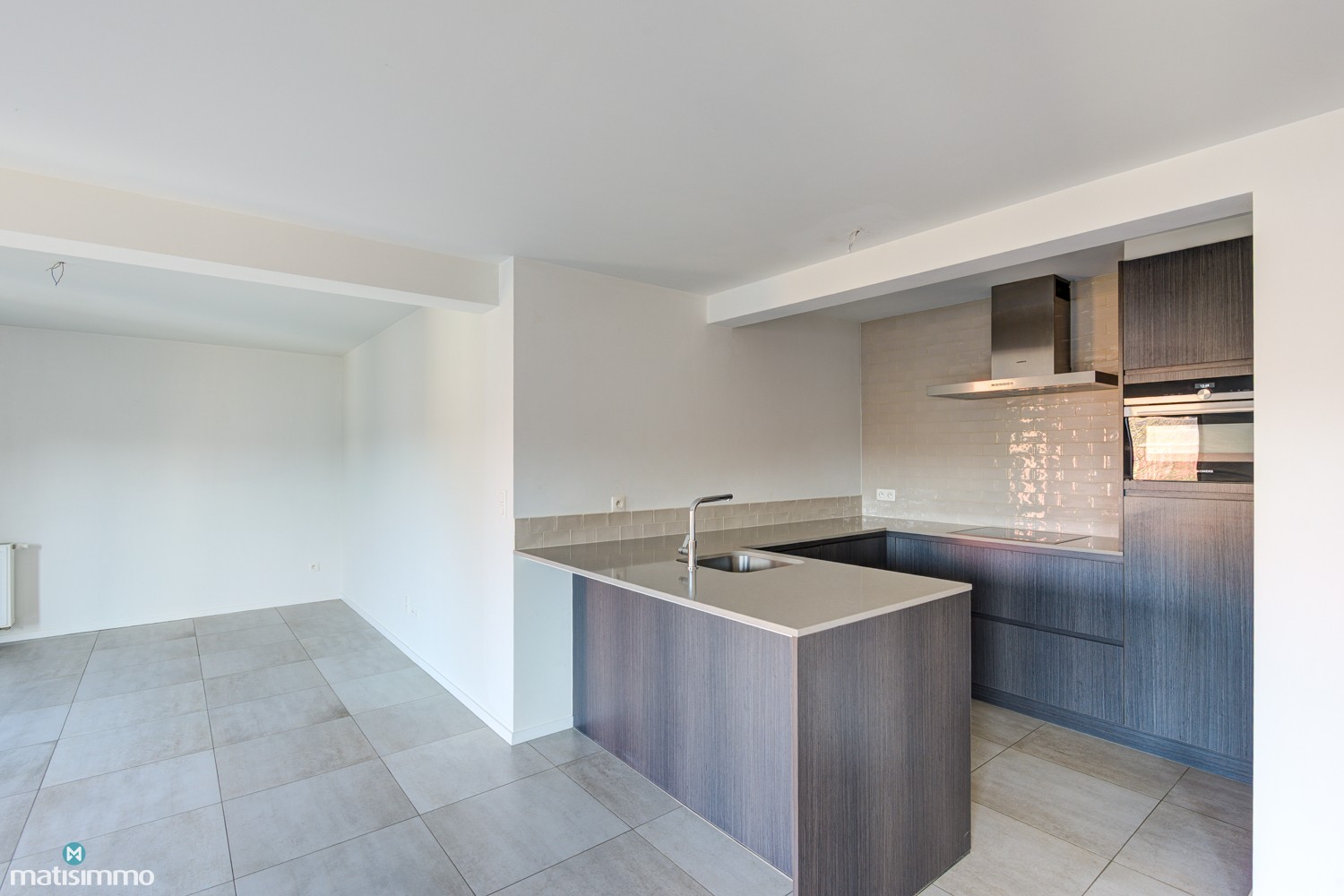 MODERN APPARTEMENT MET 2 SLAAPKAMERS EN OVERDEKT TERRAS IN HET CENTRUM VAN HOESELT - foto 5