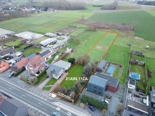 Voor meer info of een bezoek, bel 054 69 39 31 - In Aspelare (Ninove) bevindt zich deze bouwgrond voor een open bebouwing met een straatbreedte...