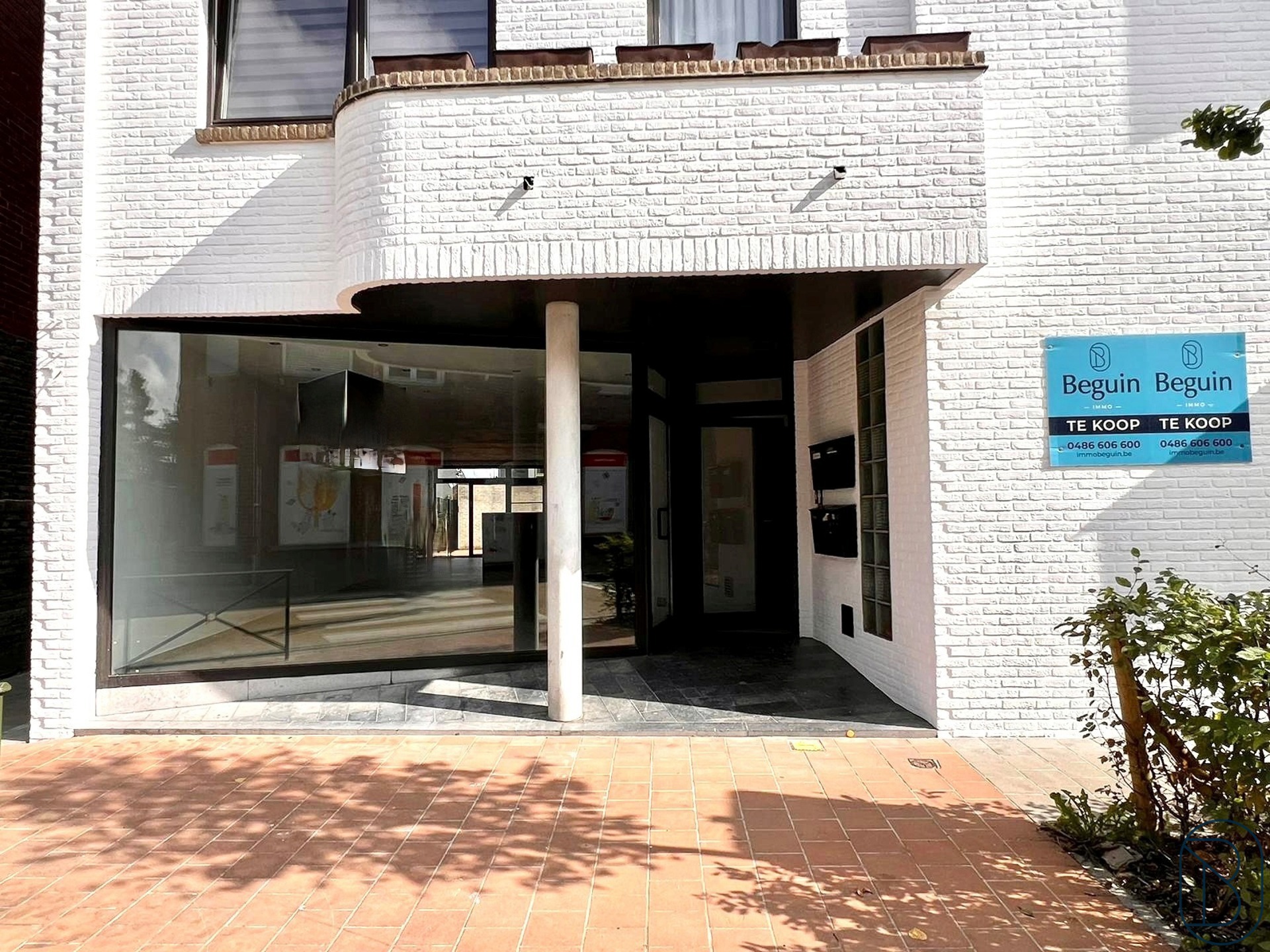 IDEALE OPBRENGSTEIGENDOM HANDELSRUIMTE + 2 APP& ONDERKELDERD - foto 2