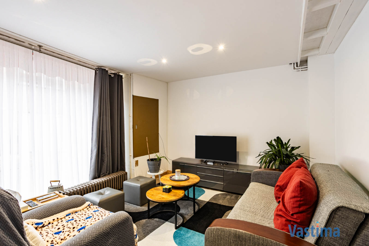 Uniek pand bestaande uit 2 woongelegenheden, garage en buitenruimte - foto 4