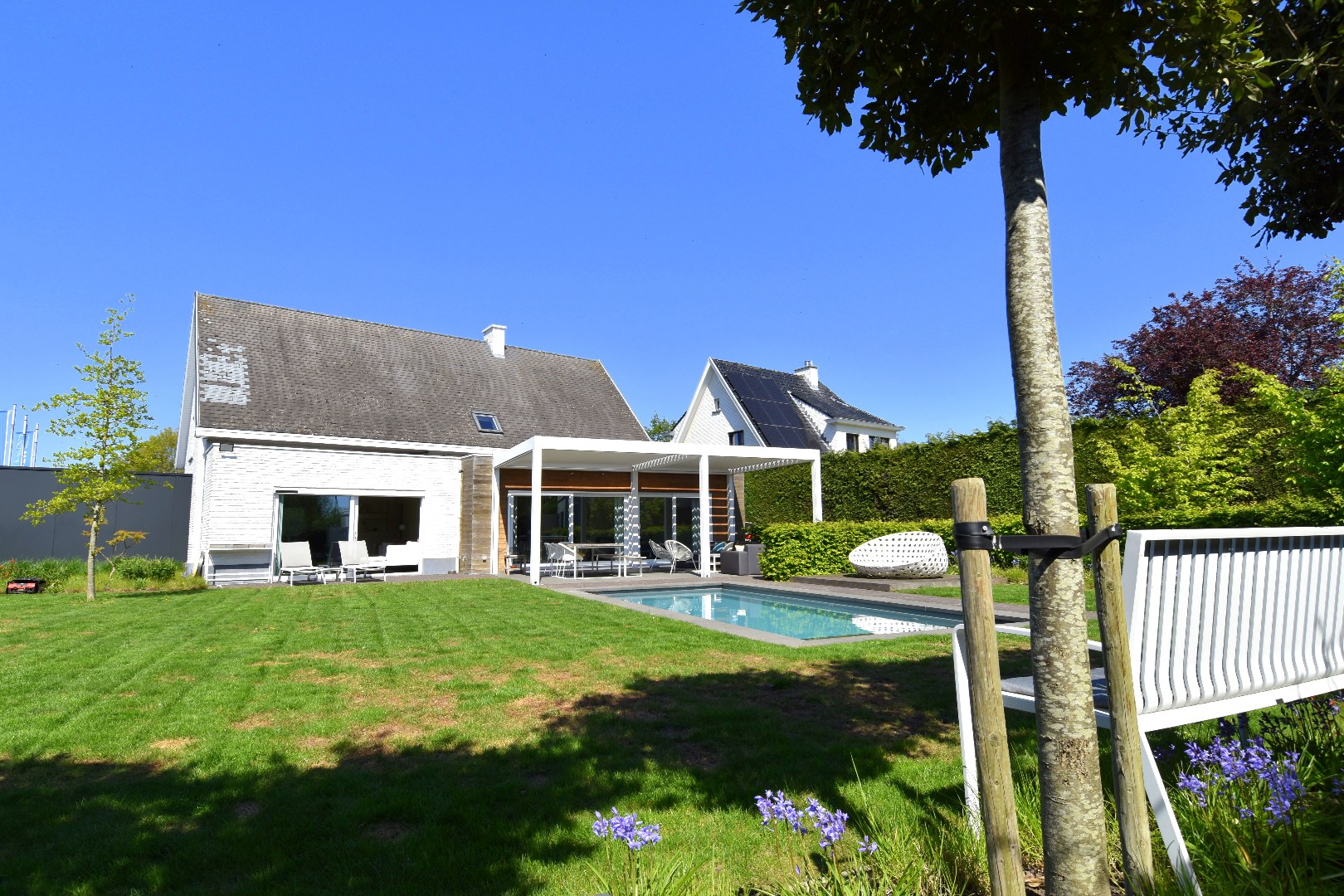 Villa met 4 slaapkamers, zwembad en mooie volumes te koop in Moorsele - foto 4