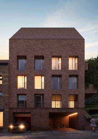 <p>In het hart van de bruisende stad Aarschot, op wandelafstand van de Grote Markt &amp; van de gezellige Theo De Beckerstraat met verschillende winkels en in onmiddellijke nabijheid van scholen, sportcentra &amp; culturele centra zoals cinema UGC, realiseert projectontwikkelaar V&amp;V Group nieuwbouwresidentie “De Vakschool”.</p>
<p><em>De oude gebouwen worden gesloopt en heropgebouwd, mogelijkheid tot aankoop aan 6%</em><br /><br />Residentie De Vakschool biedt een divers aanbod van twee- en drie-slaapkamer BEN-appartementen aan, met mooie oppervlaktes die variëren van 85m² tot 127m².<br />Voor het uittekenen van dit project waarvan de historische gevel van de vroegere vakschool wordt behouden werd een samenwerking aangegaan met gerenomeerd architectenbureau dmvA. <br /><br />dmvA zorgt voor het beste van 2 werelden. Ze zorgen dat historische kenmerken behouden kunnen blijven maar er toch comfort is van een moderne nieuwbouw. Dit resulteert in een prachtig samenspel van hoogteverschillen, geschiedenis &amp; nieuwbouw. <br />Achter de gevels, waar monument en moderne architectuur elkaar ontmoeten, vind je een oasa van rust.<br /><br />De appartementen worden volledig instapklaar afgeleverd met onder meer een volledig ingerichte hoogwaardige keuken en badkamer, die u zelf kan kiezen bij zorgvuldig geselecteerde leveranciers. Vloerverwarming, ventilatie, parketvloeren,… zijn luxe-afwerkingen die standaard mee voorzien zijn. De architecturale details en hoge afwerkingsgraad zorgen voor een exclusieve inrichting die doorheen het hele project voelbaar is.</p>
<p>Mogelijkheid tot aankoop aan 6% btw.</p>
Welkom in De Vakschool, waar wonen in hartje Aarschot een nieuwe dimensie krijgt.<br />Meer info? Bel 0468 21 65 00 of mail info@vv-realestate.be